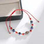 Bracelet catholique Corde Ajustable avec Perles Oeil Porte Chance - Vignette | La Paroissienne