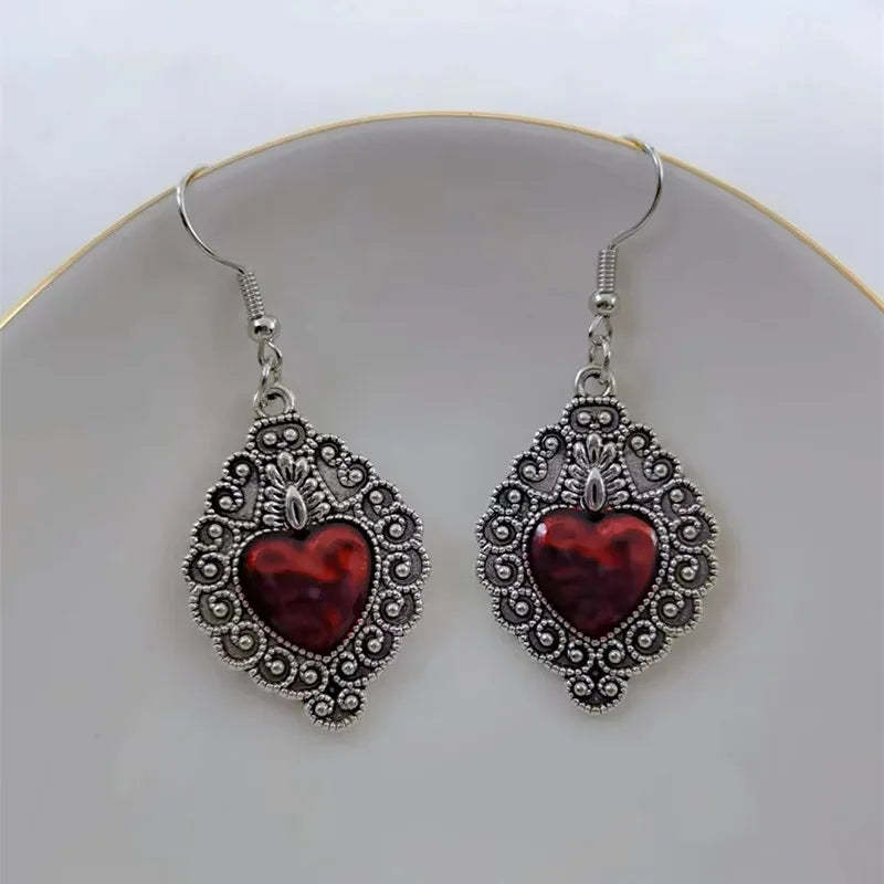 Boucles d'oreilles pendantes en alliage de zinc – Représentation du Sacré-Cœur en argent et rouge-image